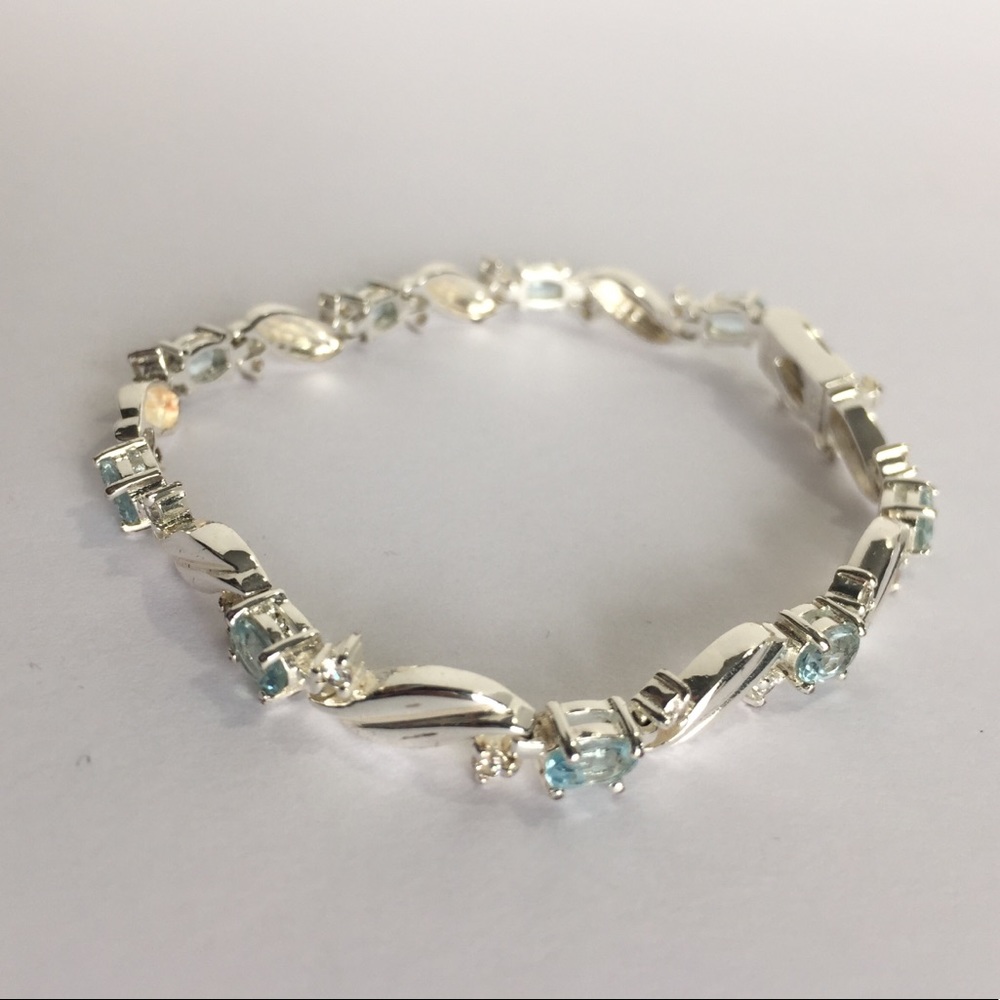 Sterling Silver Bracelet w/ blue stones detail